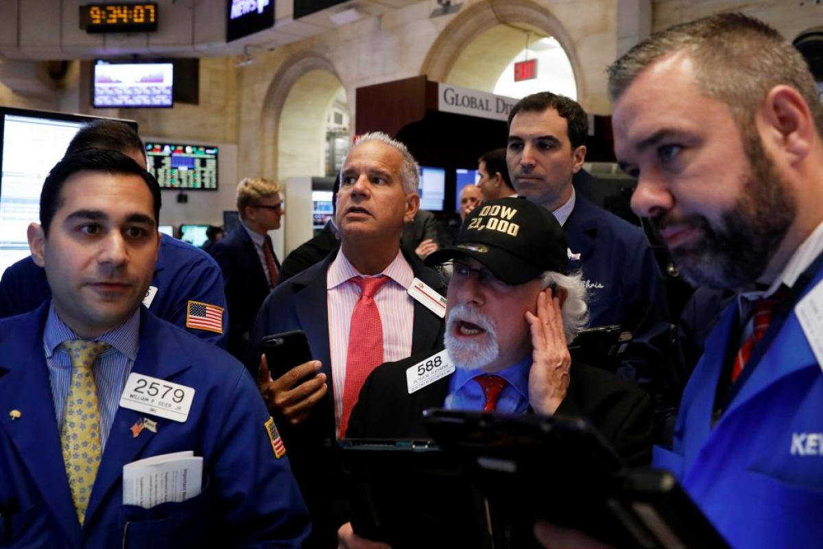 US stocks surge; Dow marks first time above 21,000 points